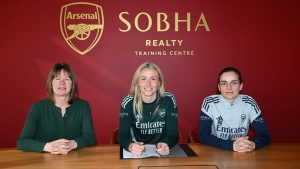 Leah-signing-contract_vcwbq4b5.jpg