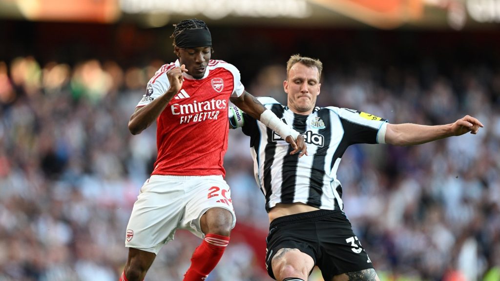 london-england-noni-madueke-of-arsenal-is-challenged-by-dan-burn-of-newcastle-united-during_z5mtp242.jpeg