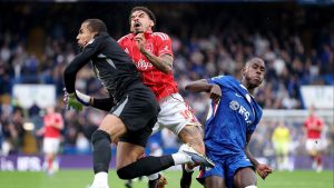 Robert_Sanchez_and_Morgan_Gibbs-White_collide.jpg
