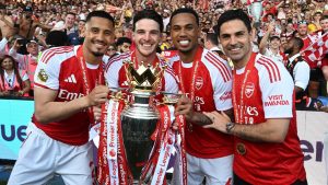 london-england-arsenals-manager-mikel-arteta-celebrates-with-william-saliba-declan-rice-and_aoaaomt8.jpeg