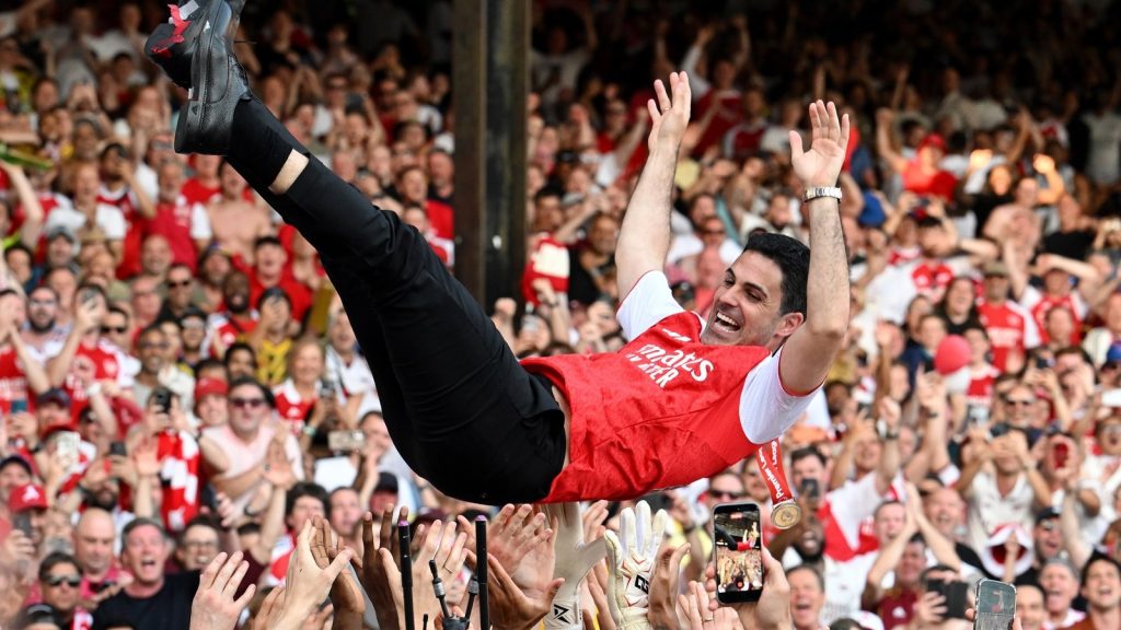 london-england-mikel-arteta-manager-of-arsenal-is-thrown-into-the-air-by-players-of-arsenal_lkujmt45.jpeg