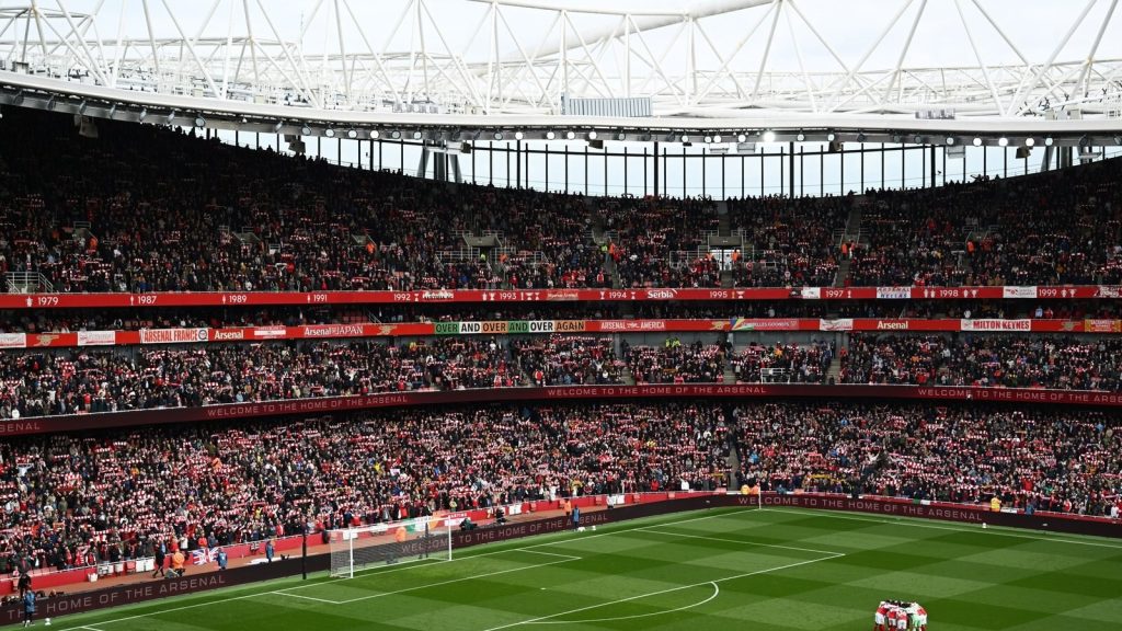 london-england-general-view-inside-the-stadium-as-players-of-arsenal-enter-a-huddle-prior-to_agvt57g.jpeg