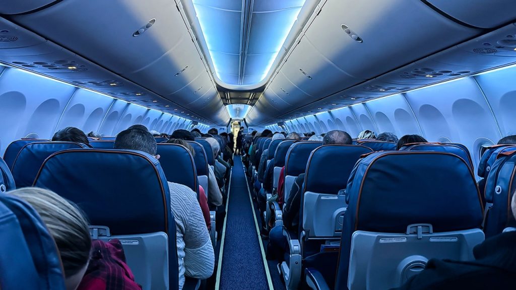 airplane-interior-with-people-seated.jpg