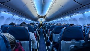 airplane-interior-with-people-seated.jpg